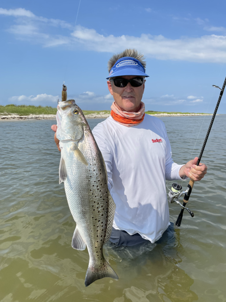 wade fishing for speckled trout